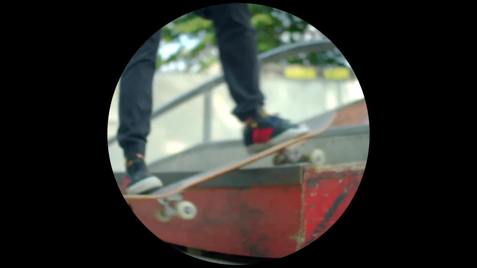 Extracted still image from the same stock video of a skater performing a backside boardslide - 16x9, with fisheye effect added with FFmpeg