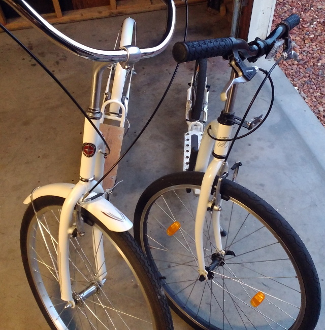 Kick Bike City G4 and Schwinn Shuffle adult scooter, side by side, front view
