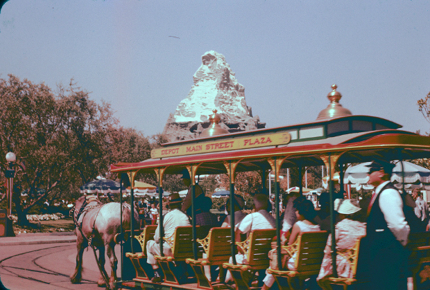 Horse-drawn trolley/streetcar rounding Central Plaza at the far end of Main Street
